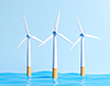 青い海に立つ三基の風力発電機を描いた、洋上風力発電のイメージの無料イラスト